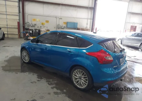 2014 Ford Focus Titanium from USA, damaged, VIN 1FADP3N23EL420520